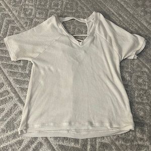 Size small open back shirt from buckle. Worn 2 times. Super cute.